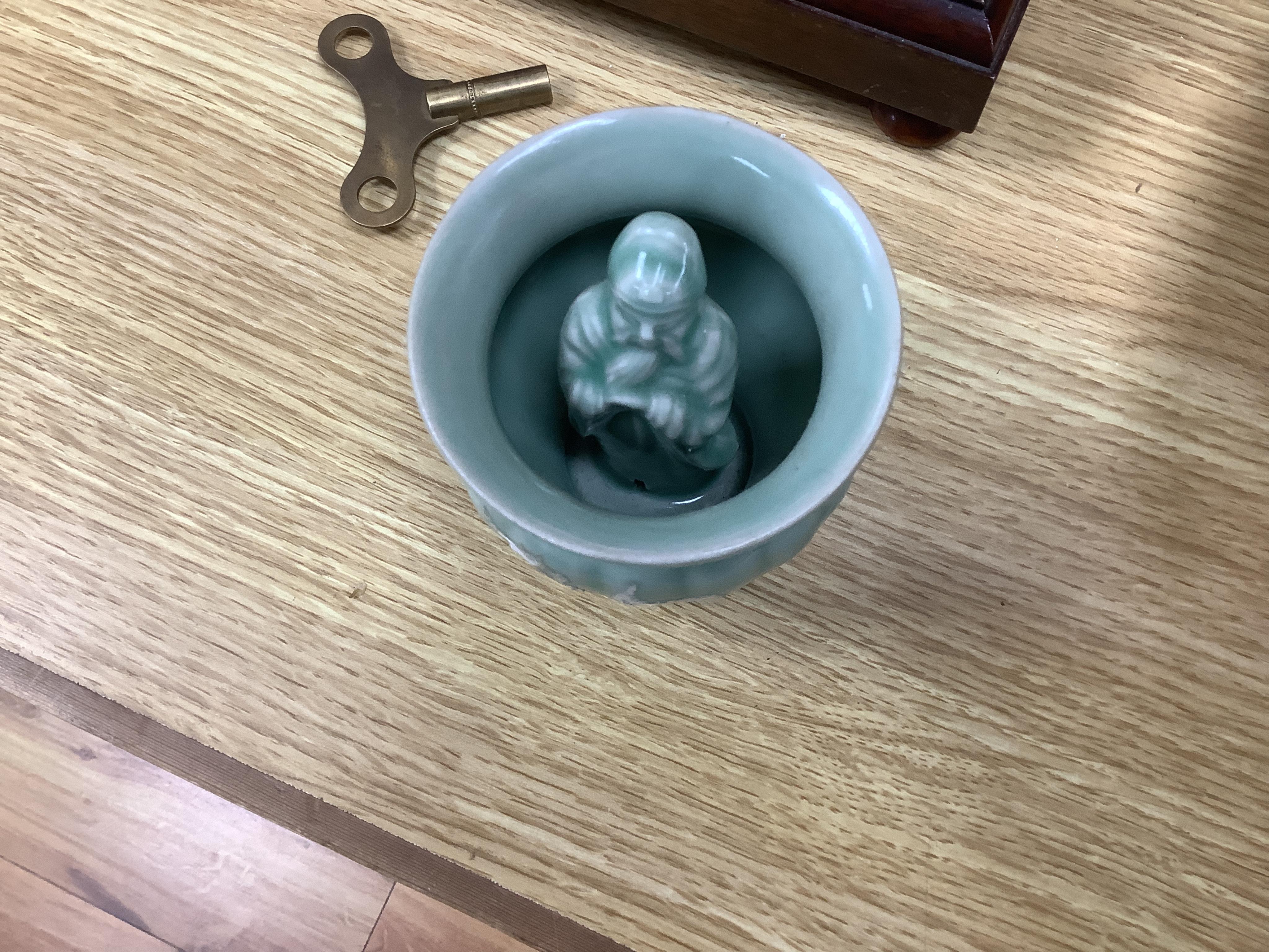 Chinese ceramics - a Celadon glazed vase, two jars and covers, a blue and white candlestick and a celadon pot, tallest 29cm (5). Condition - fair to good